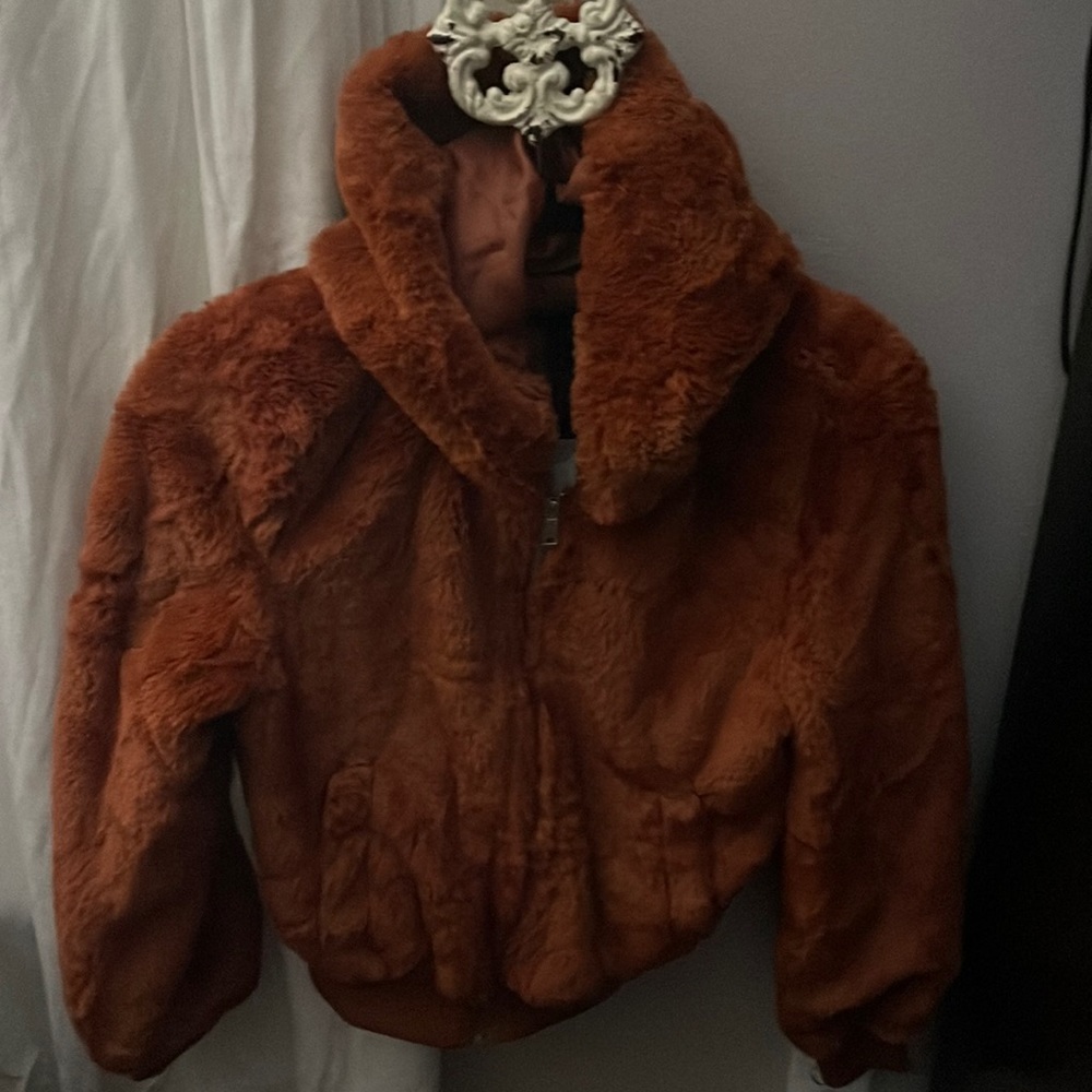 Faux fur coat.